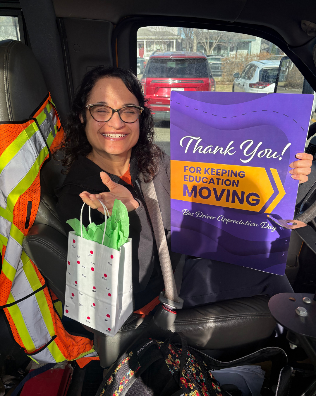 Bus Driver holding card for bus driver appreciation day